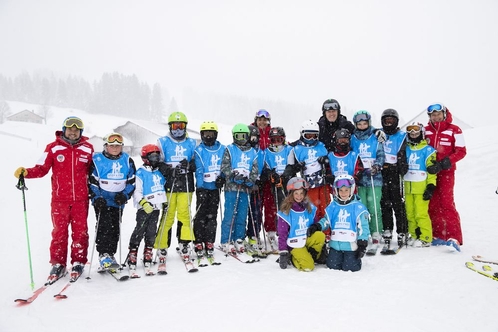 Gruppenfoto von snow4free-Teilnehmern auf der Piste